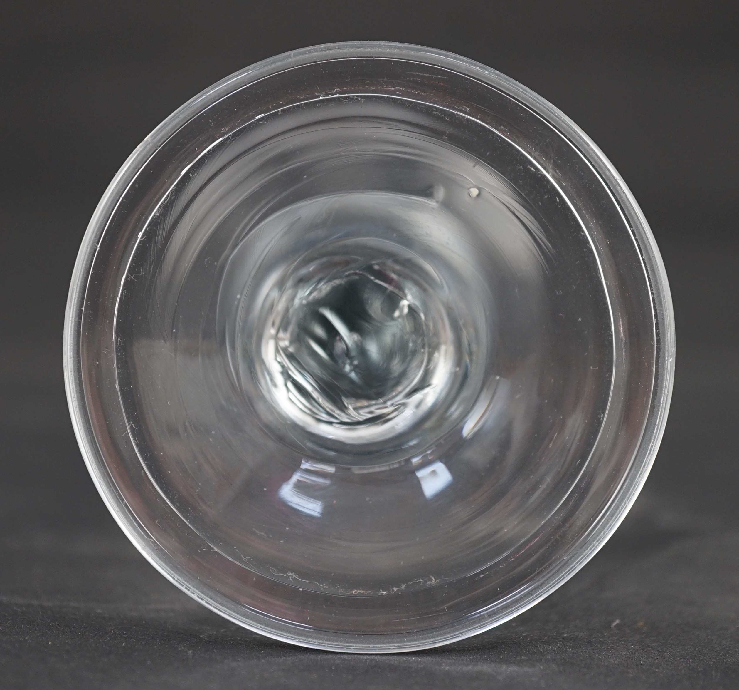 A true baluster wine or cordial glass, c.1720, the bell-shaped bowl above a tear drop baluster stem, - Image 5 of 5