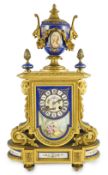 A 19th century French ormolu and Sevres style porcelain mantel clock, with architectural urn