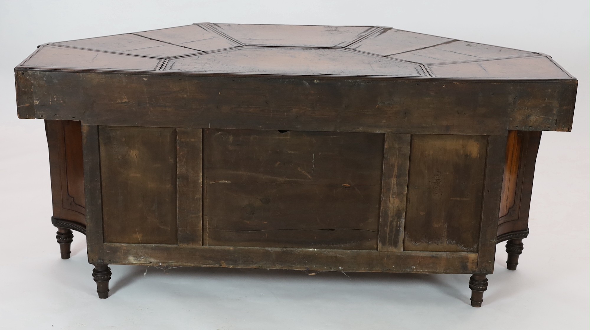 An unusual George IV mahogany kneehole desk, of demi-octagonal form, with segmented leather lined - Image 4 of 4