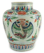 A Chinese Transitional wucai ‘dragon and phoenix roundel’ vase, 17th century, the roundels between