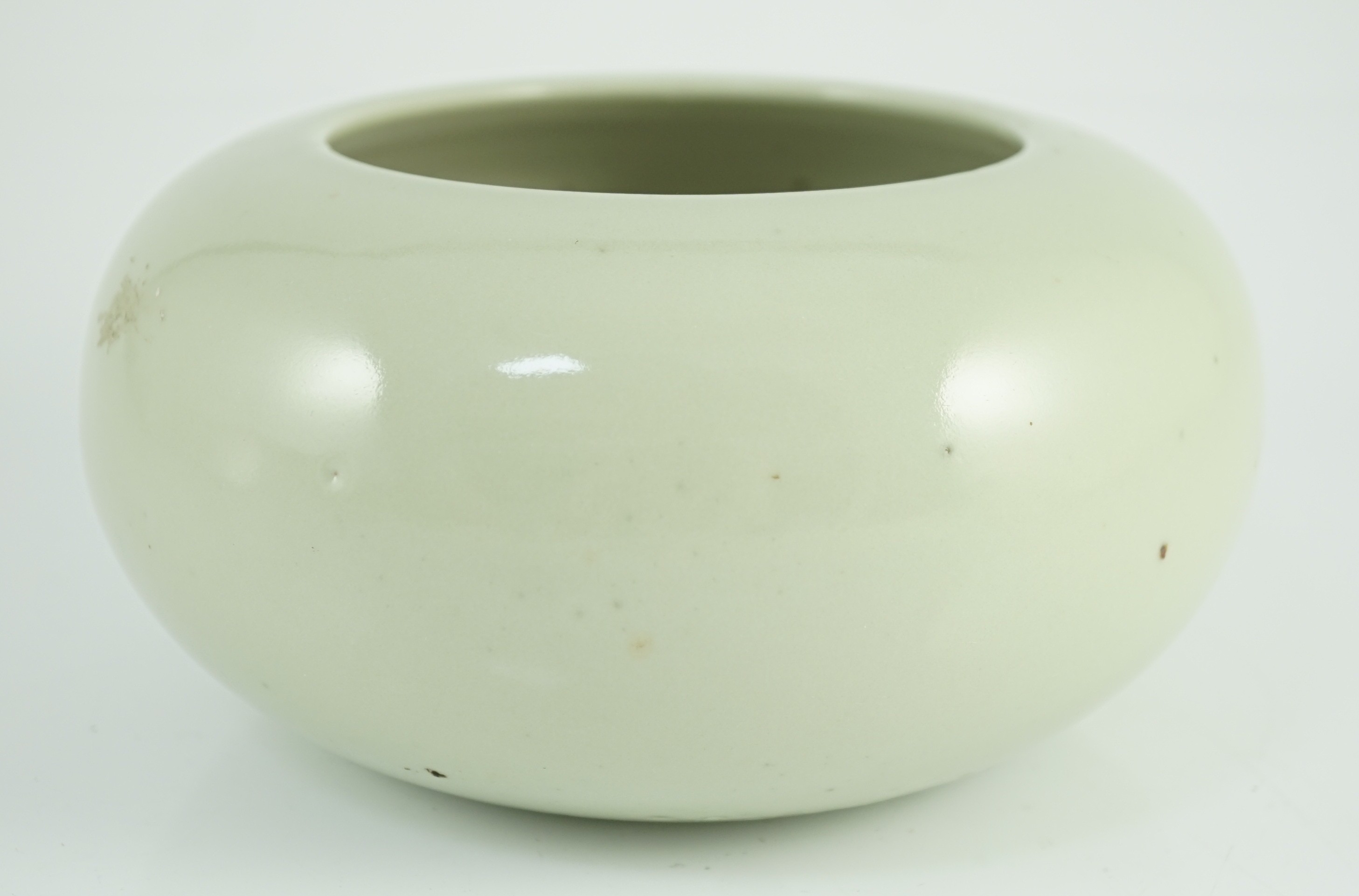 A Chinese celadon glazed water pot or alms bowl, late 19th century, with concave and unglazed - Image 2 of 5