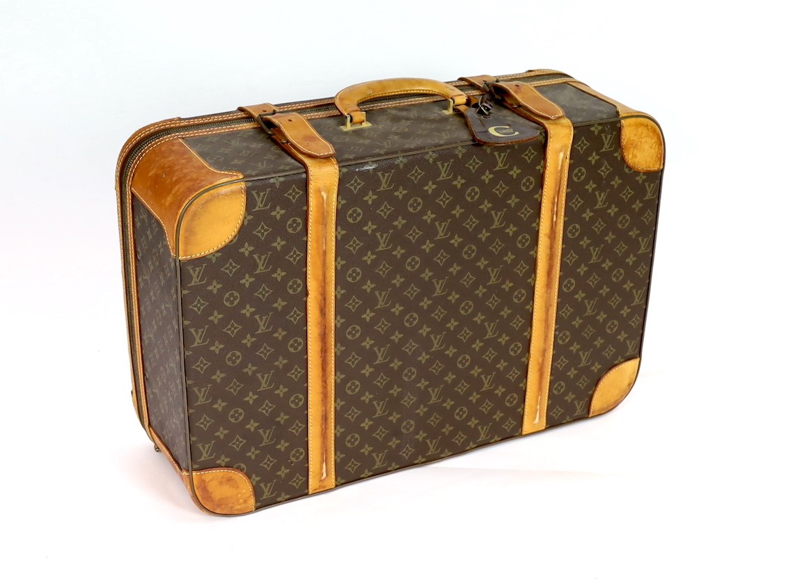 A 1980/90s Louis Vuitton canvas monogram suitcase, with calf leather straps and brass hardware, - Image 4 of 5