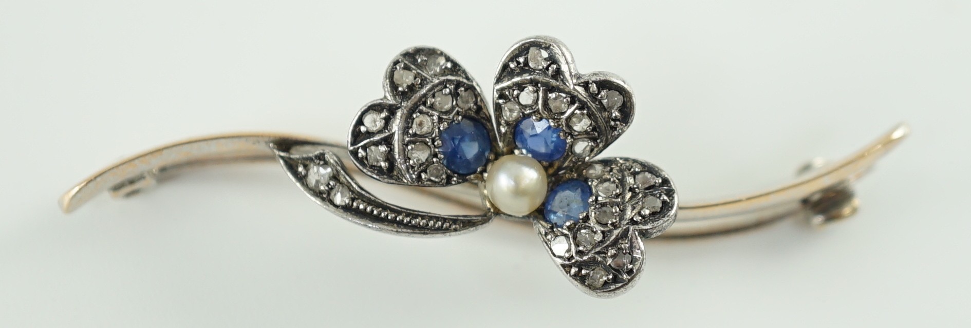 A 1920’s white gold, sapphire, cultured pearl and rose cut diamond set shamrock bar brooch, numbered - Image 4 of 4