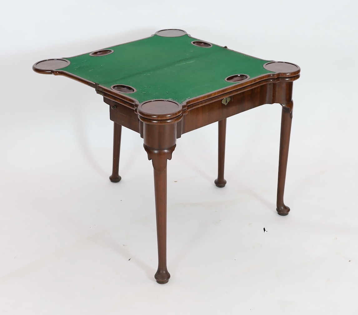 A George II mahogany games table, with eared triple folding top opening to reveal a baize surface - Image 2 of 6