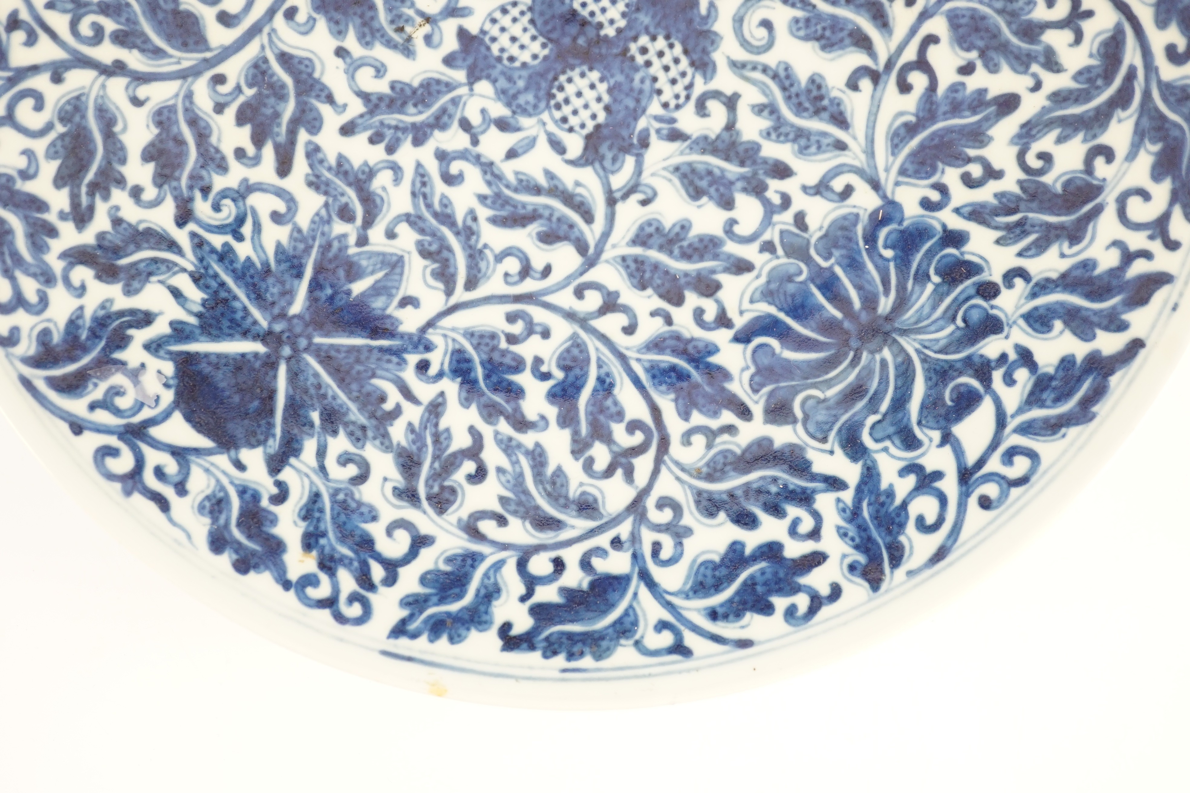 A Chinese blue and white dish, Kangxi mark, 19th century, the centre painted with four - Image 4 of 7