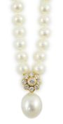 A late 1990's single strand cultured pearl and diamond cluster set necklace, with 18ct gold clasp