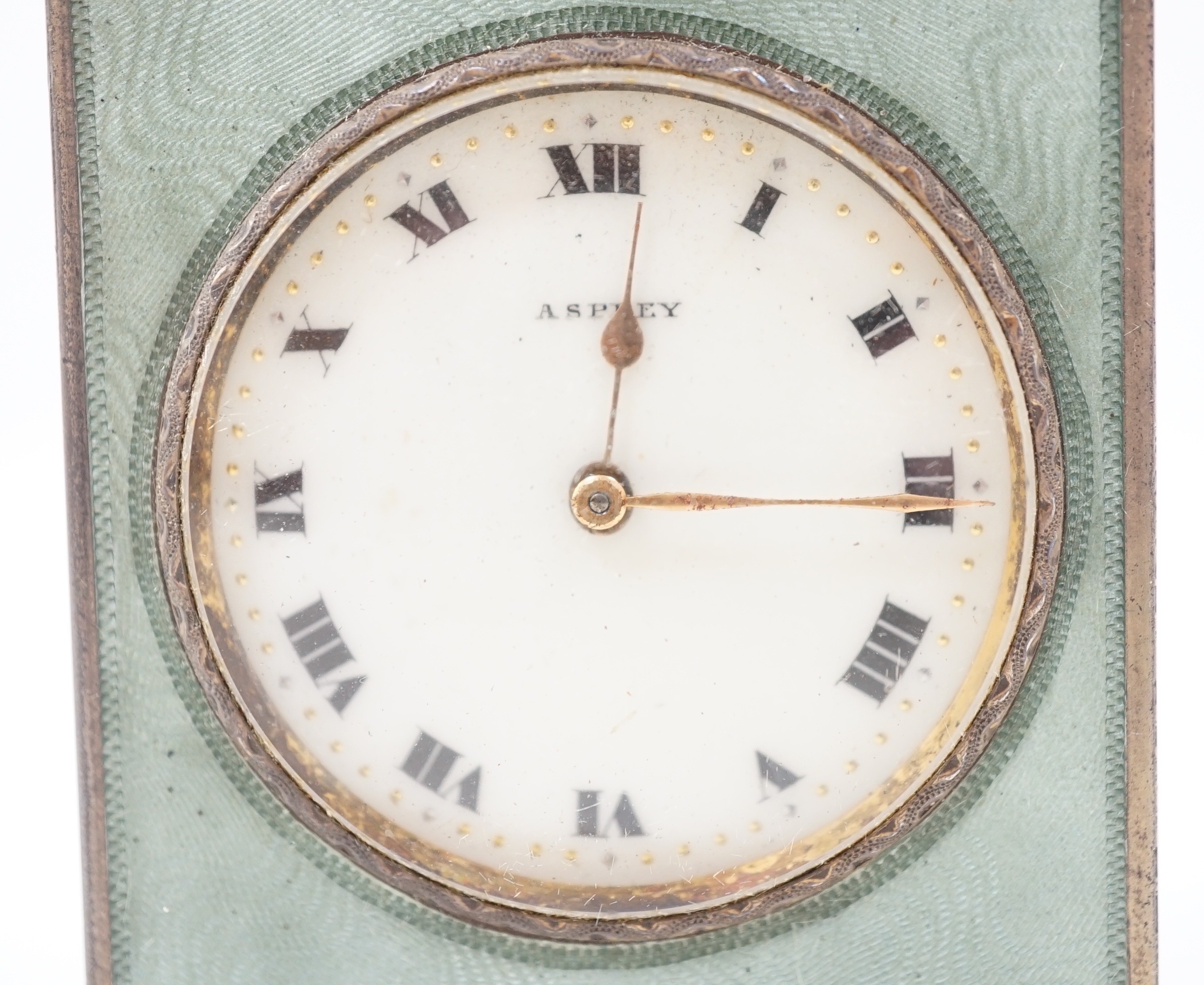 A George V silver and green guilloche enamelled travelling timepiece, retailed by Asprey, in - Image 4 of 11