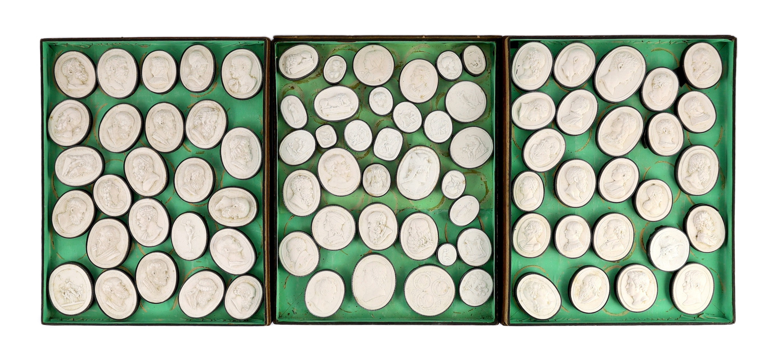 A cased set of eighty three Italian Grand Tour plaster roundels after intaglios of various subjects,