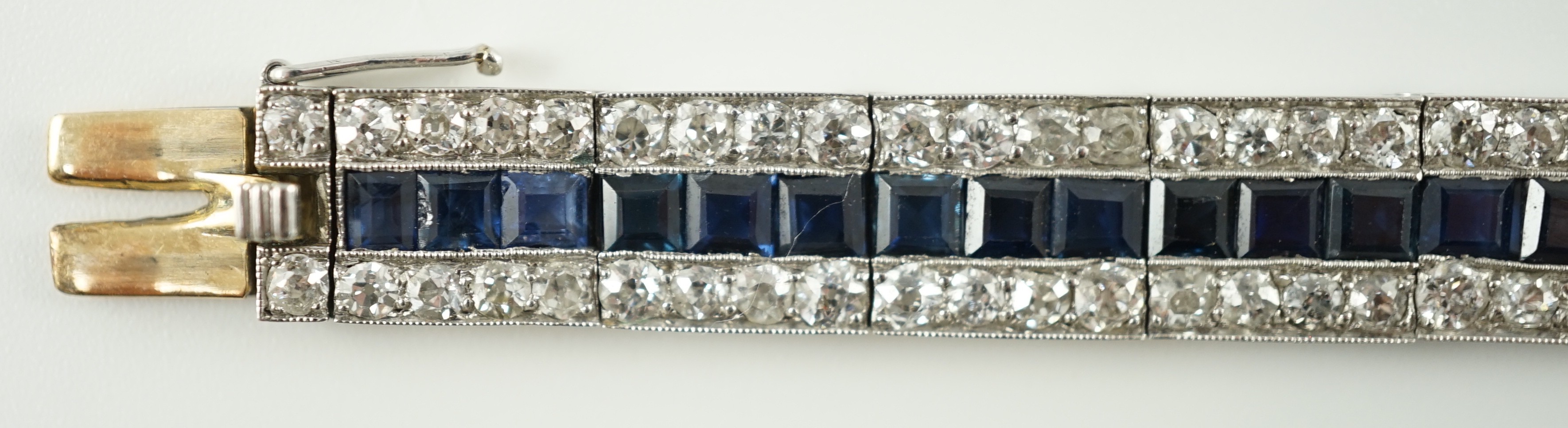 A 1920’s white gold, sapphire and diamond set triple line bracelet, with engraved setting and two - Image 4 of 9