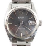 A 1980's mid-size stainless steel Rolex Oysterdate Precision manual wind wrist watch, on a stainless