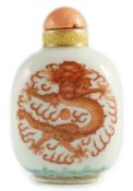 A Chinese enamelled porcelain ‘peacock and dragon’ snuff bottle, Jiaqing mark and period (1796-