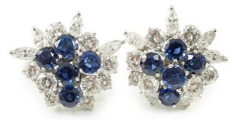 A pair of modern 750 white gold, set sapphire and diamond cluster ear studs, each set with five