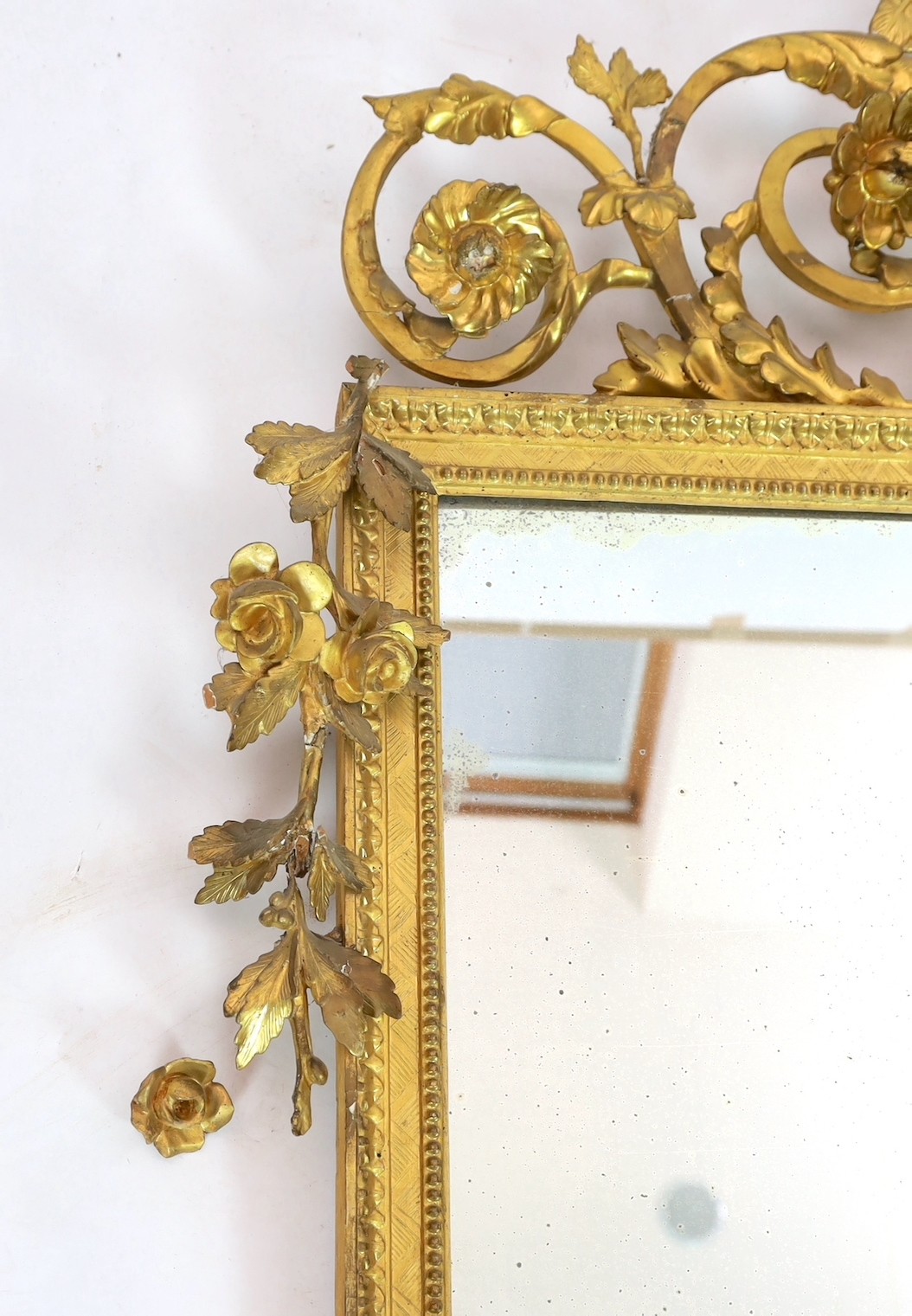 A 19th century century carved giltwood wall mirror, with elaborate ornate eagle and flowering swag - Image 2 of 4