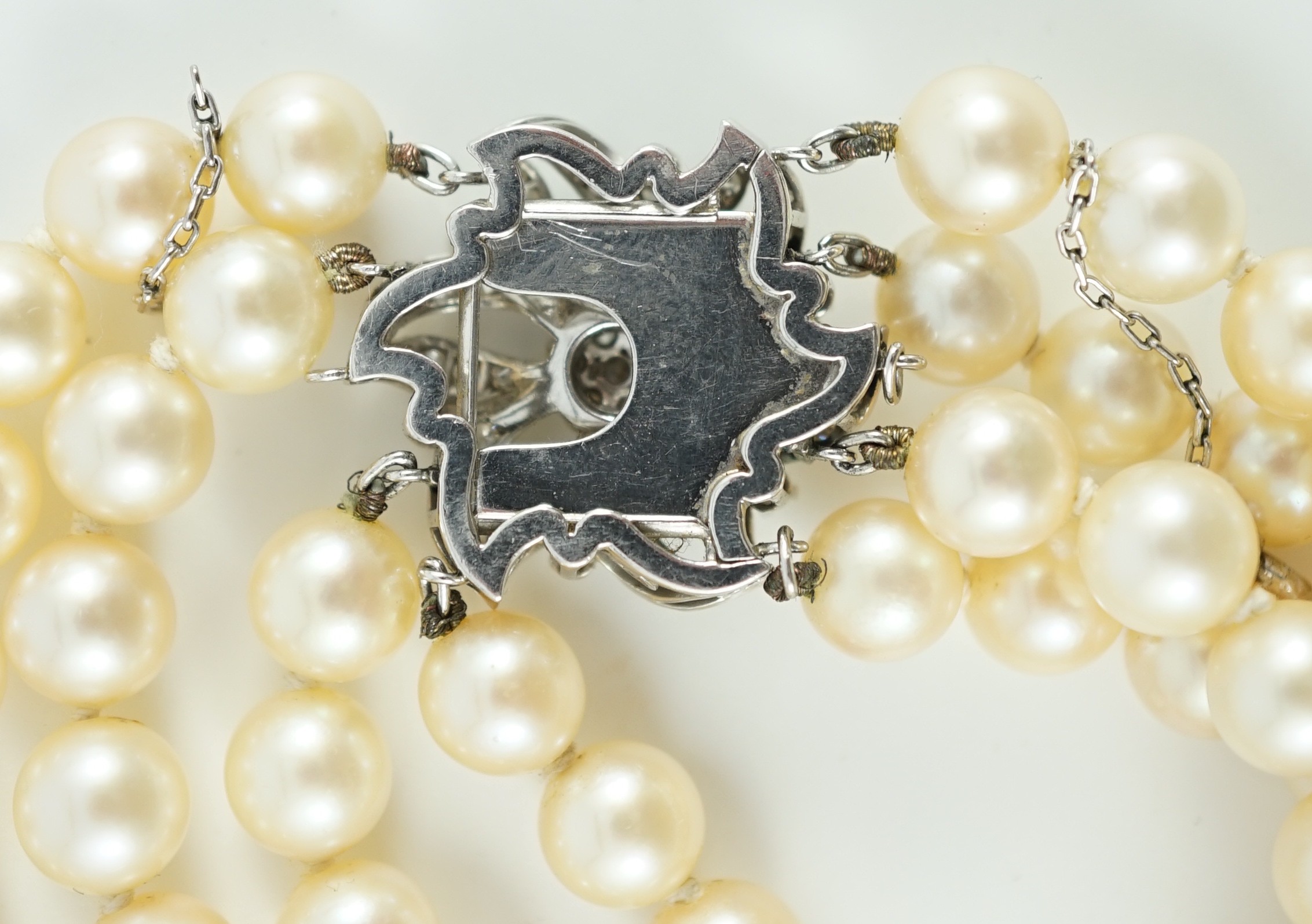 A mid to late 20th century continental quadruple strand cultured pearl necklace, with white gold and - Image 7 of 7