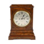 George Blackie, 392 Strand, London. A Victorian figured walnut mantel clock, in plain