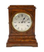 George Blackie, 392 Strand, London. A Victorian figured walnut mantel clock, in plain