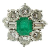 A mid 20th century 18kt white gold, single stone emerald and round and baguette cut diamond