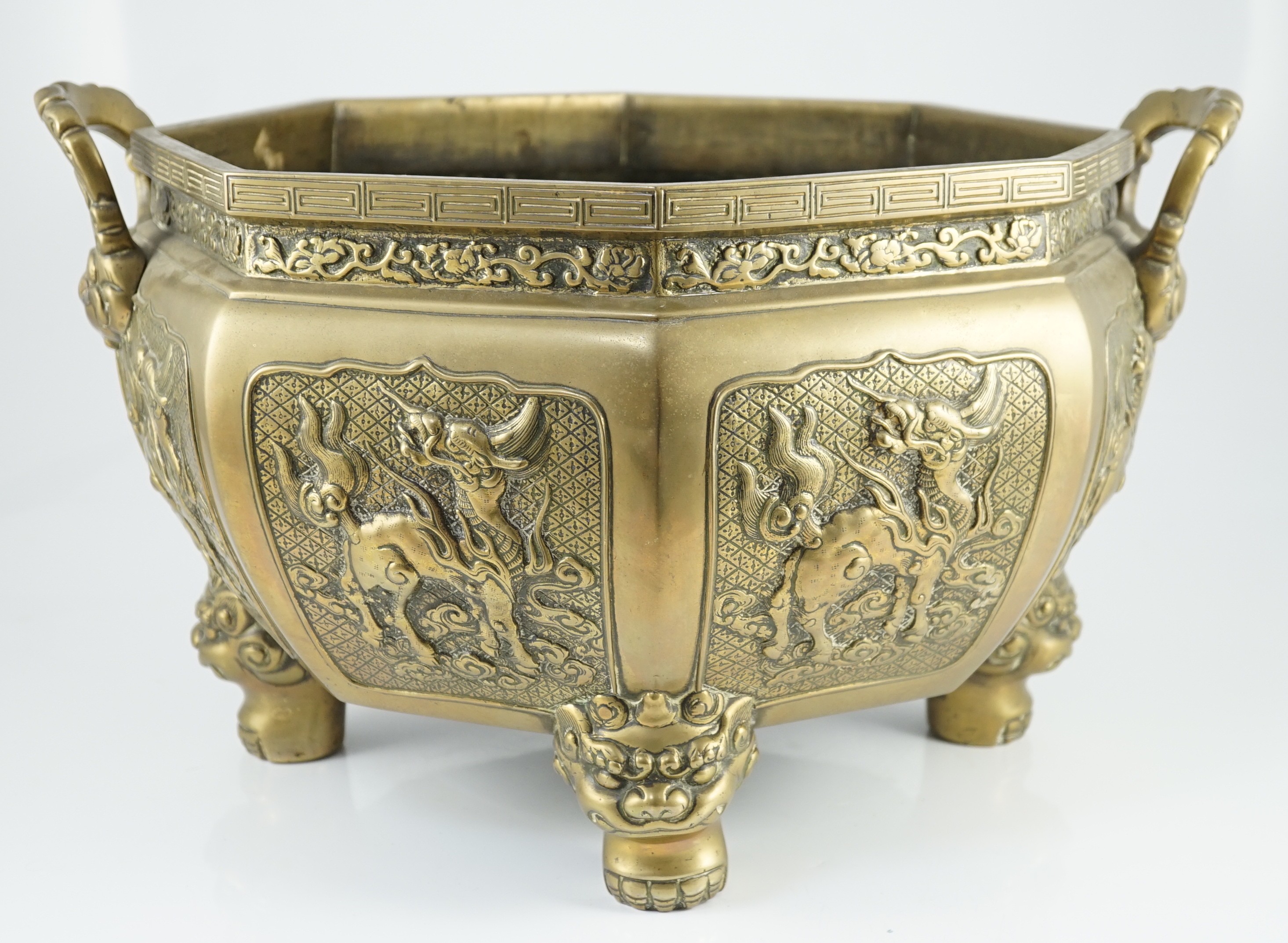 A large Chinese polished bronze octagonal jardiniere, 19th century, each side cast in relief with - Image 2 of 9