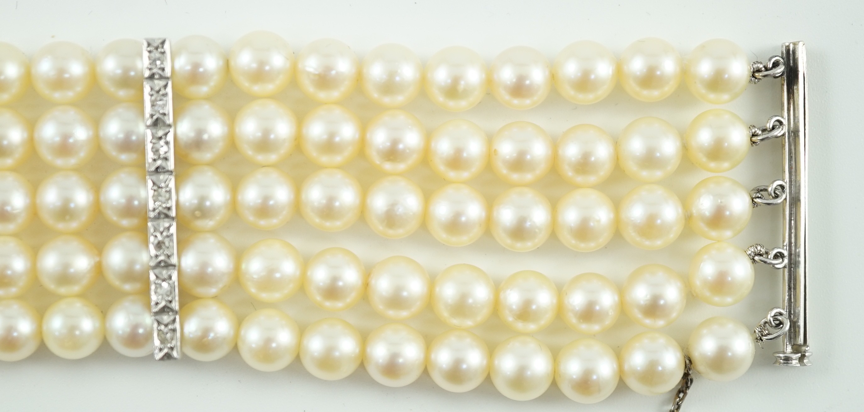 A mid to late 20th century continental quintuple strand cultured pearl bracelet, with white gold and - Image 5 of 7