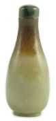 A Chinese celadon and brown jade pear form snuff bottle, 19th century, 7.2cm high***CONDITION
