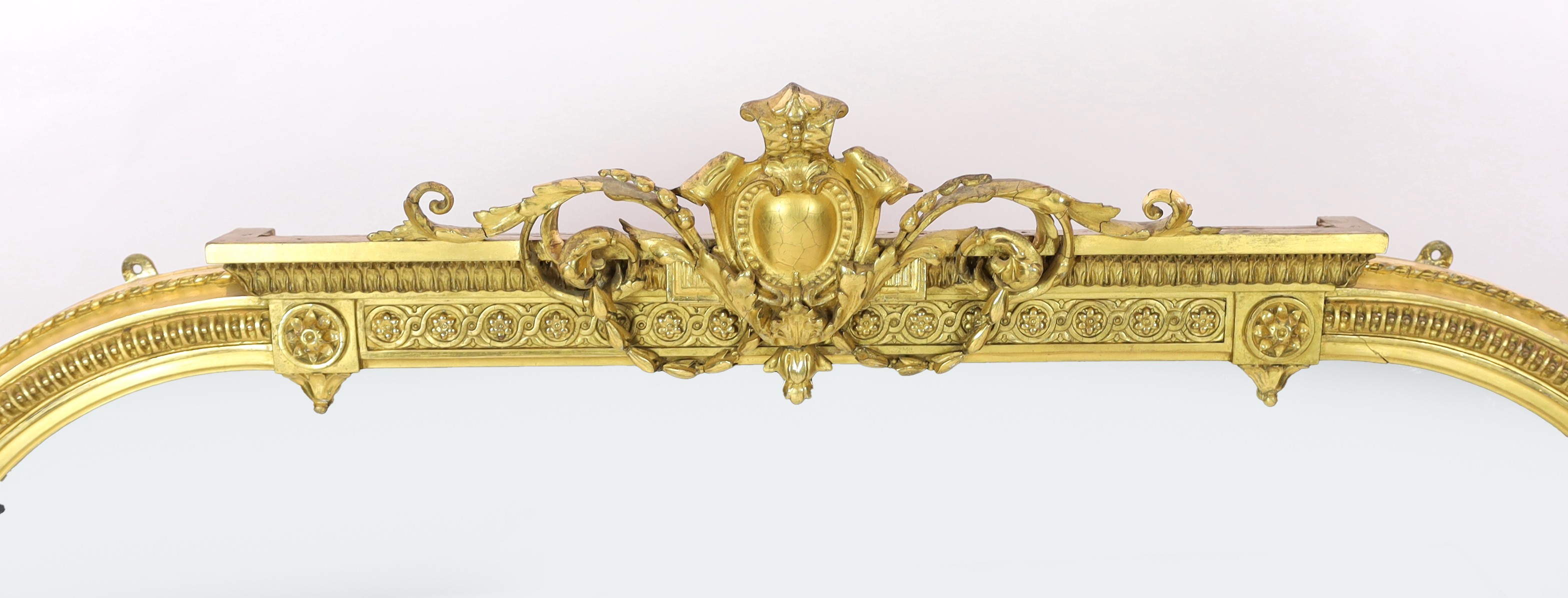 A Victorian giltwood and gesso overmantel mirror, of arched form with foliate scroll crest and - Image 2 of 5