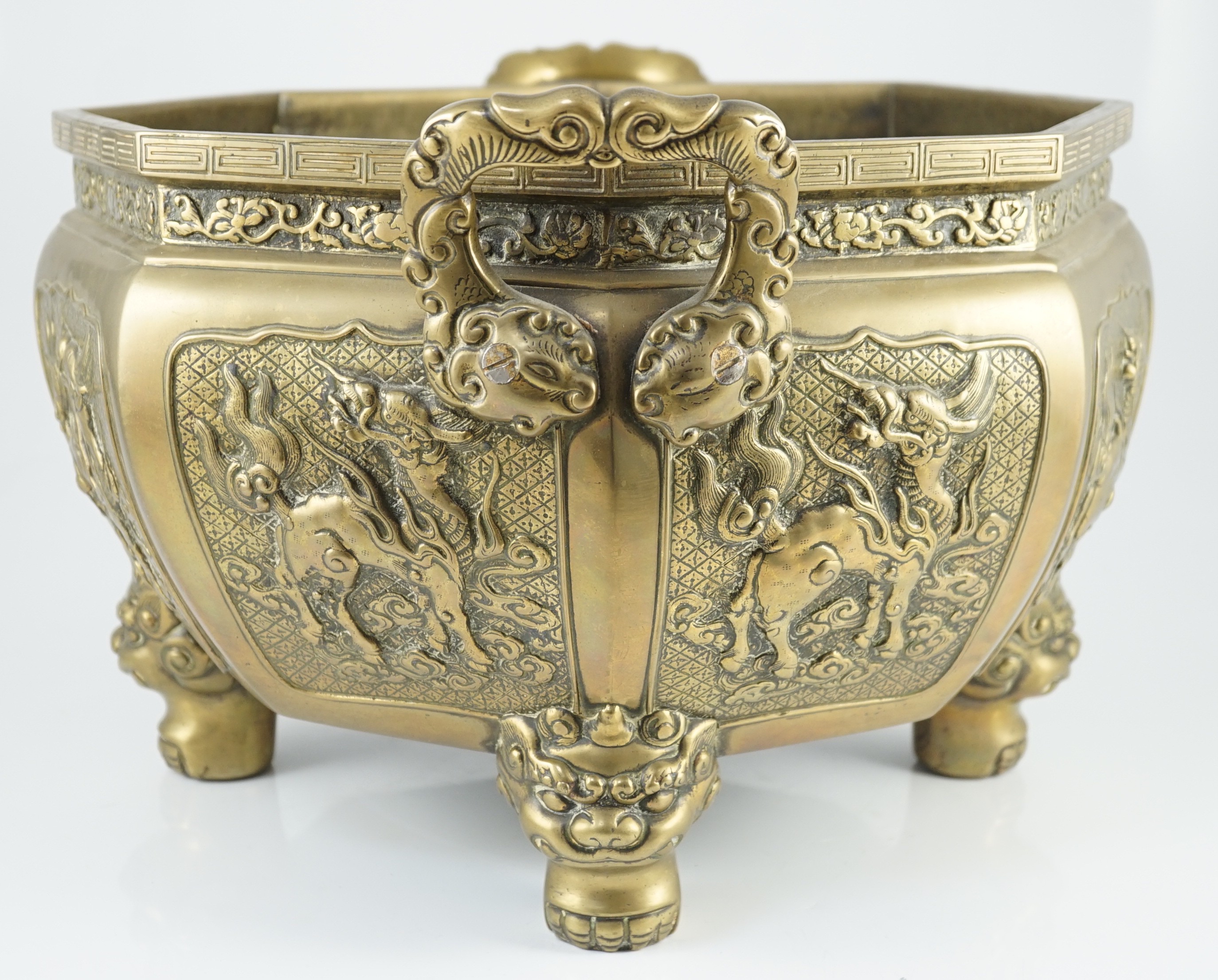 A large Chinese polished bronze octagonal jardiniere, 19th century, each side cast in relief with - Image 5 of 9