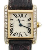 A lady's 2000 18k gold Cartier Tank Francaise square dial quartz dress wrist watch, with round
