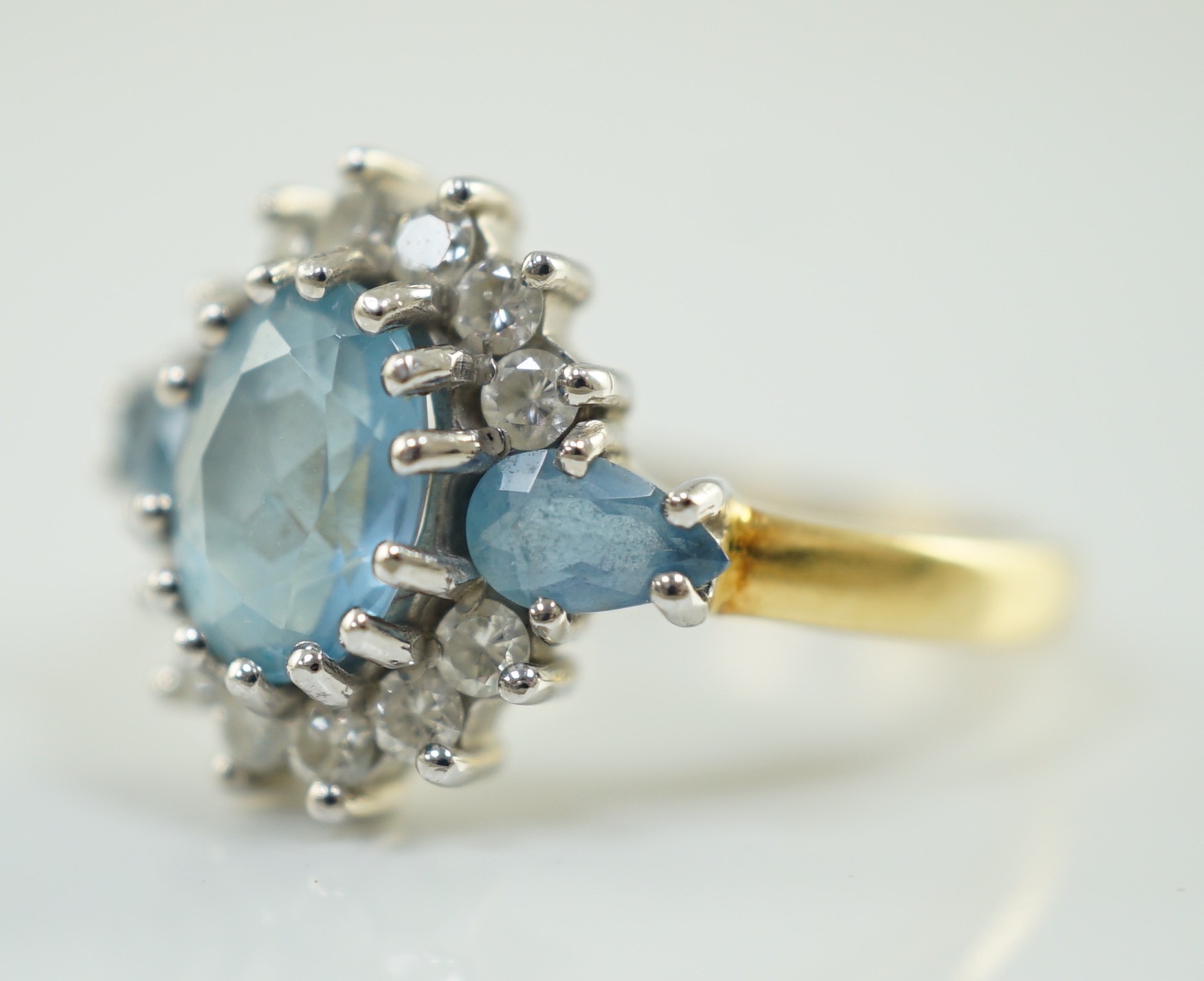 A 1970's 18ct gold, aquamarine and diamond set oval cluster ring, by Cropp & Farr, set with three - Image 2 of 6