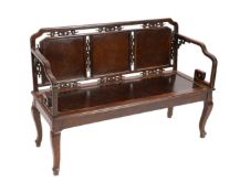 A Chinese huanghuali and burr wood bench seat, with triple panel back interspersed with stylised