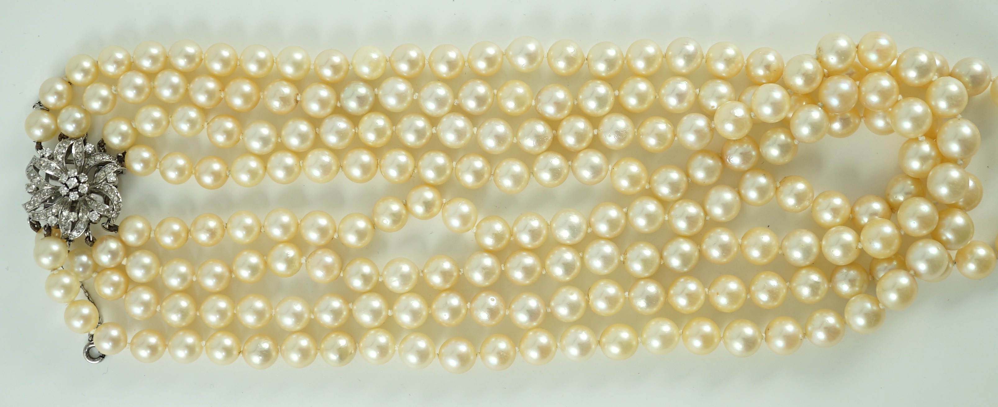 A mid to late 20th century continental quadruple strand cultured pearl necklace, with white gold and - Image 5 of 7