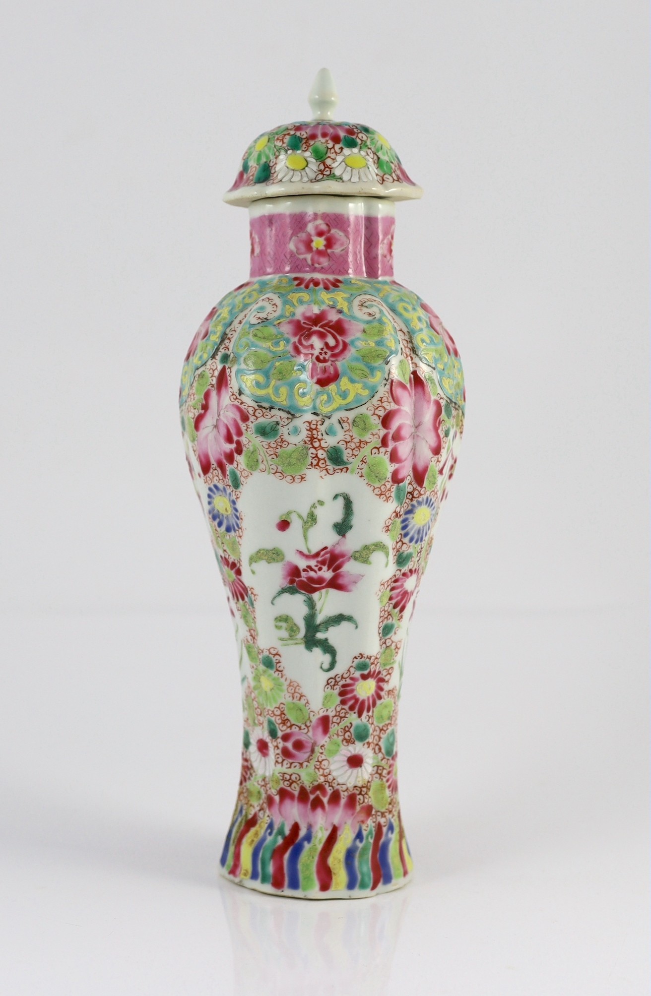 A Chinese famille rose moulded baluster vase, Qianlong period, painted with trailing flowers on a - Image 3 of 7
