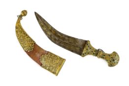 An Indian gilt copper and paste mounted dagger (jambiya), Kutch, 19th century, with bejewelled