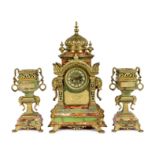 A late 19th century French ormolu mounted marble and green onyx clock garniture, of Indian