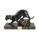 Irene Rochard. A French Art Deco bronzed spelter and marble model of a black panther, standing