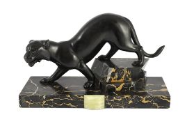 Irene Rochard. A French Art Deco bronzed spelter and marble model of a black panther, standing