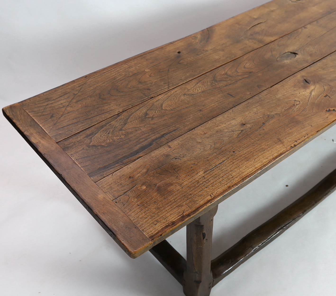 A late 17th / 18th century oak and elm refectory table, with triple planked top, on octagonal legs - Image 2 of 4