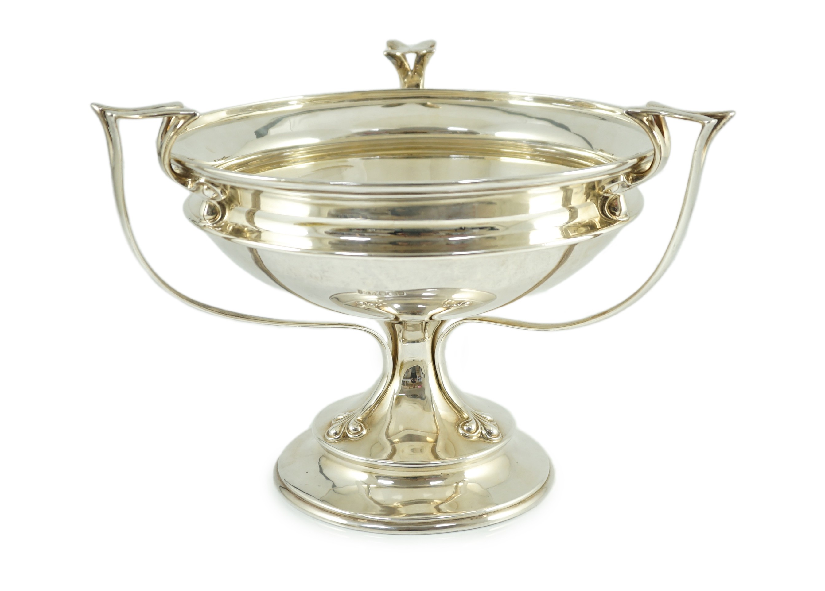 An Edwardian Art Nouveau silver tri-handled pedestal fruit bowl, by Joseph Rodgers & Sons, with