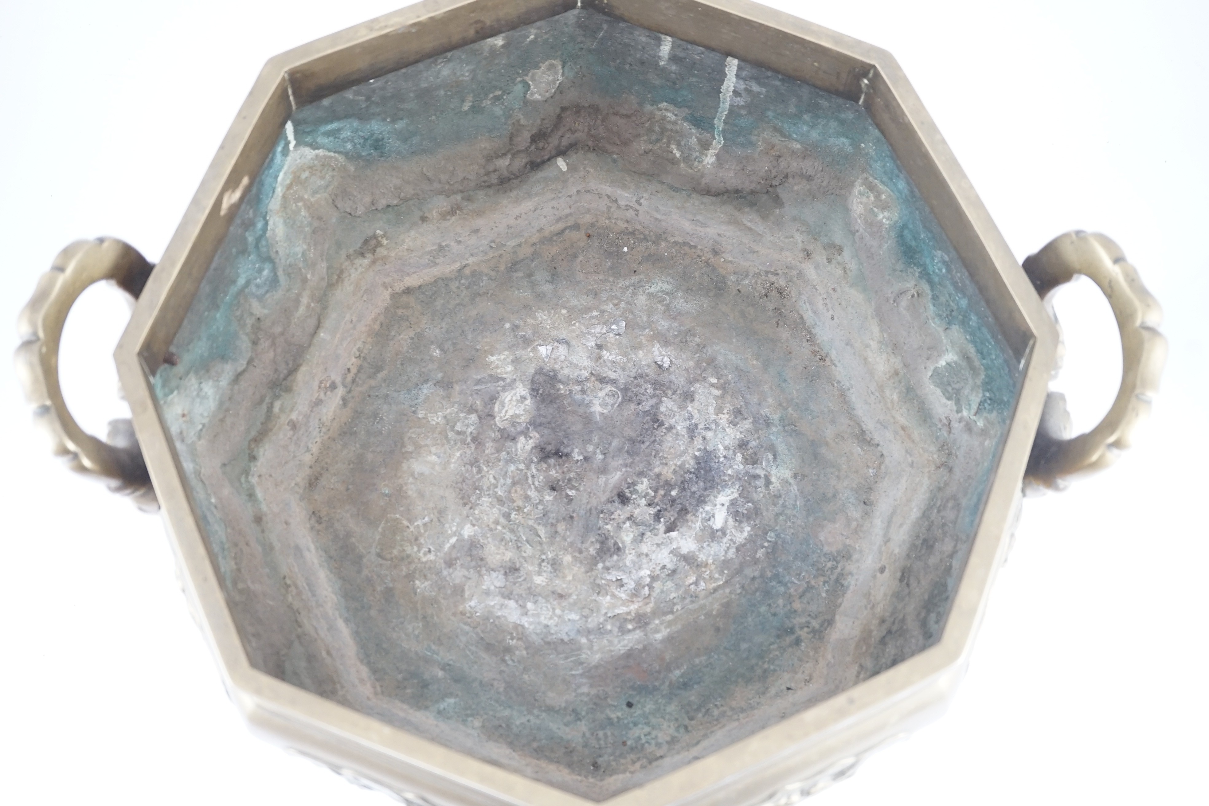 A large Chinese polished bronze octagonal jardiniere, 19th century, each side cast in relief with - Image 3 of 9