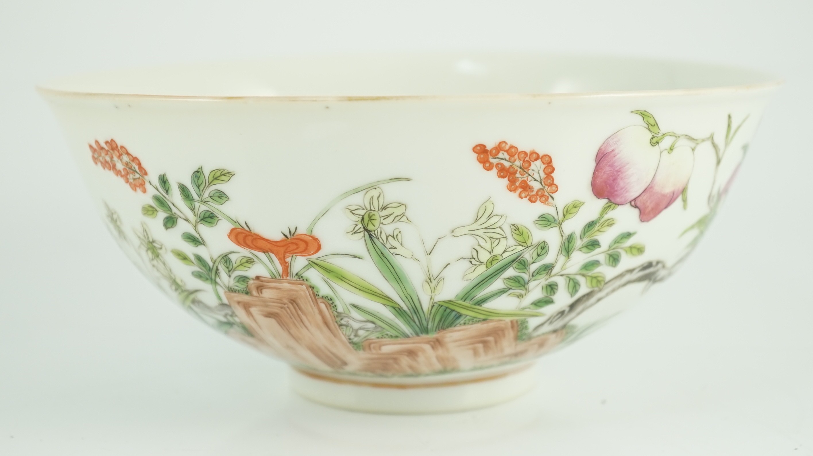 A Chinese famille rose bowl, Guangxu period, painted with rocks, linzghi fungus, a fruiting peach - Image 7 of 7