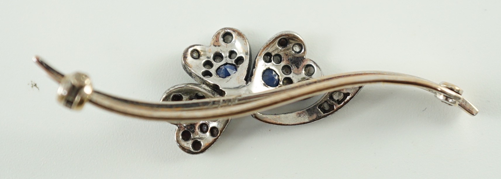 A 1920’s white gold, sapphire, cultured pearl and rose cut diamond set shamrock bar brooch, numbered - Image 3 of 4