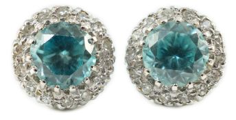A pair of 18k white gold, blue zircon and diamond set circular cluster ear studs, diameter 8mm,