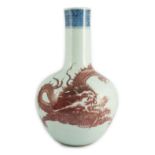 A rare Chinese underglaze blue and copper red 'dragon' vase, tianqiuping, 18th century, painted with