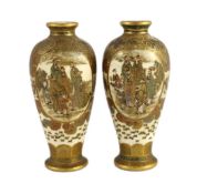 A pair of Japanese Satsuma pottery vases, signed Hankizan, Meiji period, each finely painted with an