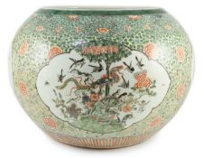 A large Chinese famille verte jardiniere or fish bowl, 19th century, painted to four reserves with a