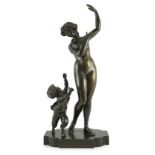 A 19th century French bronze group of a muse dancing alongside a faun, 24cm wide, 52cm high***