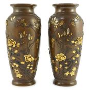 A pair of Japanese mixed metal bronze vases, by Nogawa workshop, Meiji period, each with relief
