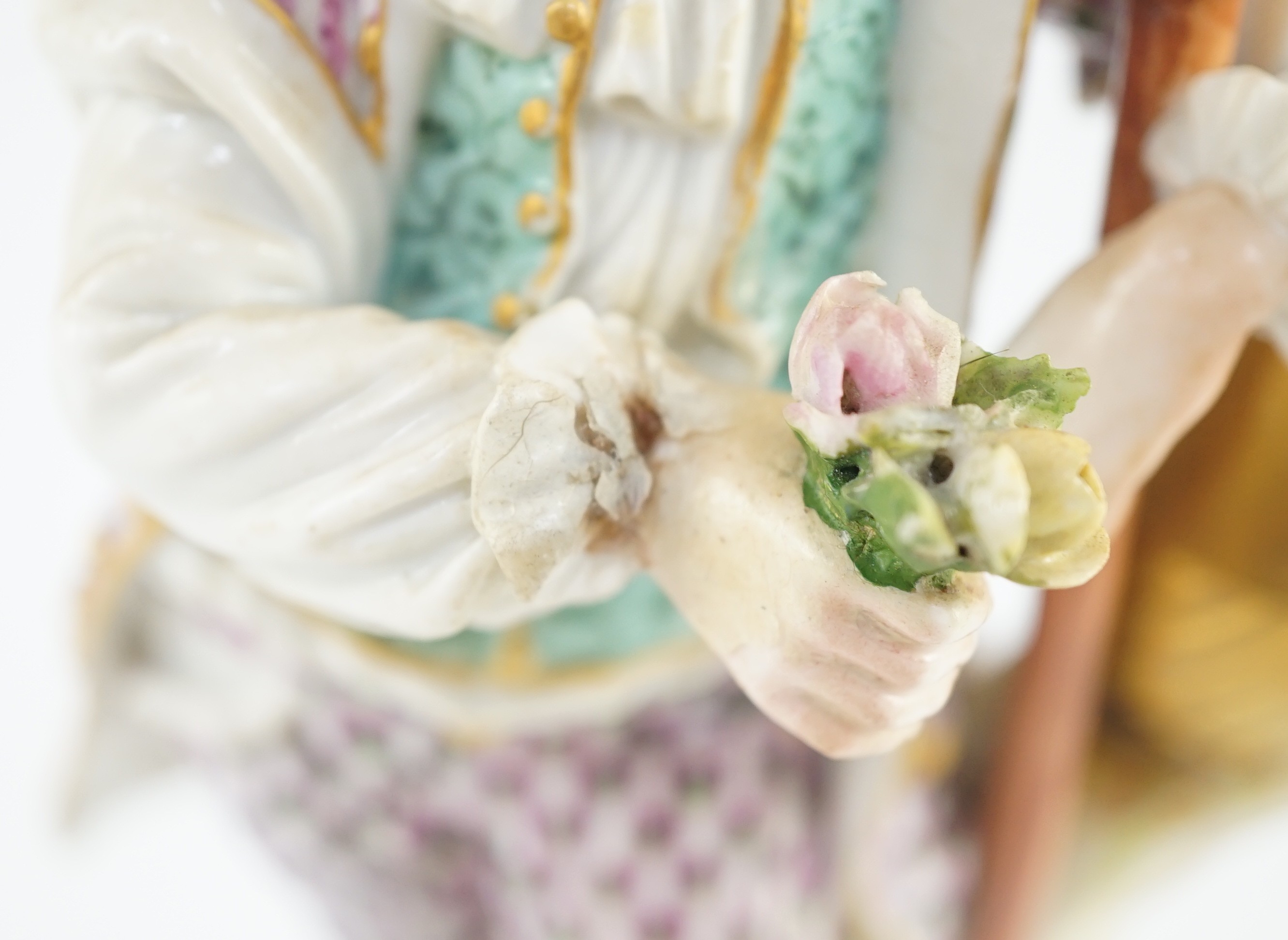 A Meissen figure of a gardener, c.1770, modelled by Michel Victor Acier, holding a posy of flowers - Image 7 of 7