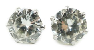 A pair of white gold and solitaire diamond set ear studs, the stones diameter 6.2mm and 6.3mm, gross