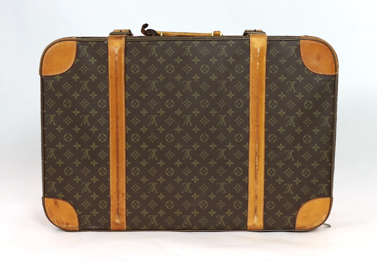 A 1980/90s Louis Vuitton canvas monogram suitcase, with calf leather straps and brass hardware, - Image 2 of 5