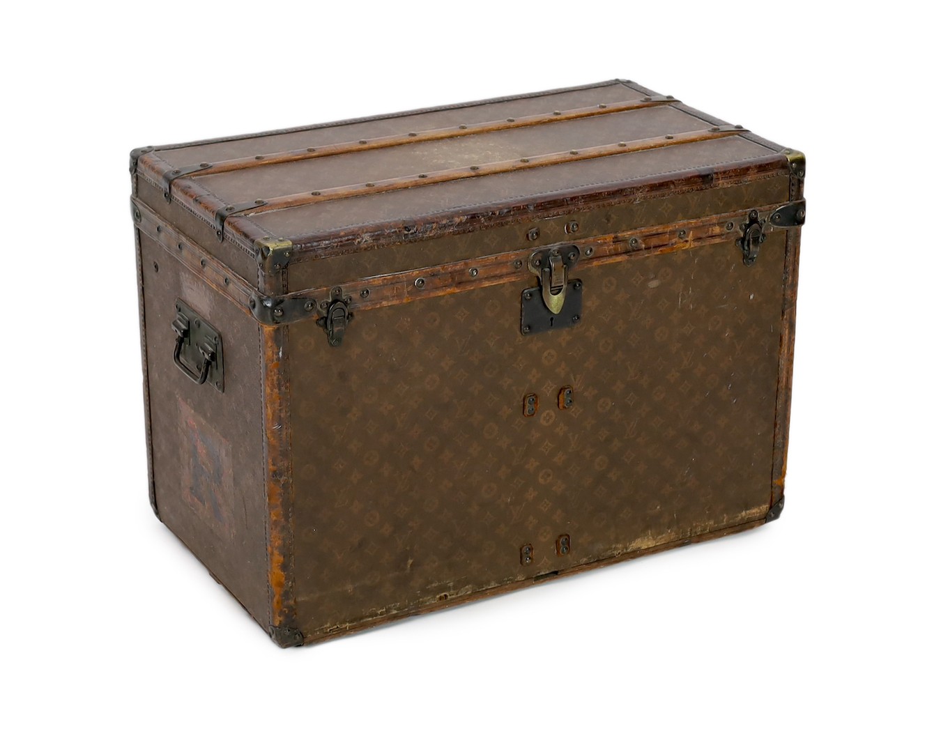 A Louis Vuitton brass mounted leather bound trunk, c.1910, numbered 137426, with LV covering and